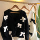 Off White Cardigan With Bow Details